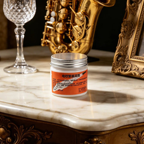 All In One Conductive Grease for Electronics and Woodwinds, 3.53oz White Paste Delivers Stable Conductivity, Safe on Nickel, Brass, and Gold Connectors, Keeps Wind Instrument Switches Smooth and Refurbishes Worn Parts. Jar on marble surface
