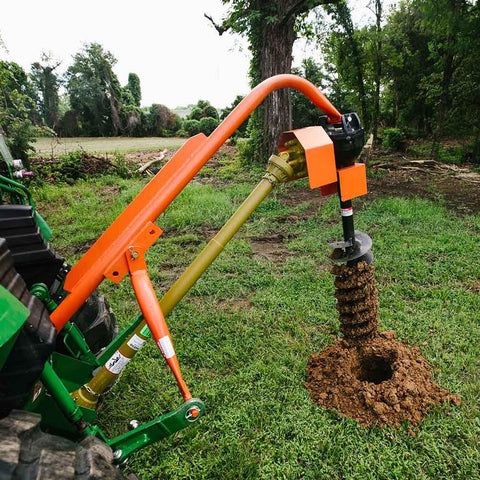 Three Point Post Hole Digger With 12 Inch Auger For Cat 1 Tractors 30 HP Rear Mounted Beefy Workhorse digging hole in field