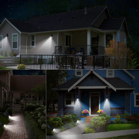 Sun-Powered Outdoor Spotlight Set No-Fuss 2-Pack 2-In-1 Solar Path Lights illuminating house facades and garden paths at night.