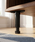 Close-up of plastic furniture leveling feet on cabinet from 4-Pack Adjustable Bed Frame Support Legs With Locking Buckles, Height Adjustable 5.9 to 9.4 Inches