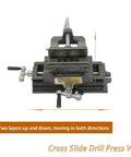 Built Like An Absolute Tank Cross Slide Drill Press Vise With Smooth Dual Axis Compound Movement Crafted From Solid Cast Iron For Zero Play Precision Clamping Every Garage Fix, top view showcasing adjustable clamps.