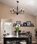 Dining room with Black 6 Light Farmhouse Chandelier With Rustic Industrial Vibe, height adjustable pendant lighting.