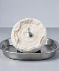 Get This Awesome Lurrosse 6 Pack Buffing Wheel Set For Your Drill With 1/4 Inch Shank And Soft Cloth Pad For Serious Metal Polishing And Fast Shiny Results, showing a white buffing wheel with shank.