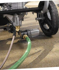 Heavy Duty Inline Water Sediment Filter for Garden Hose or Car Wash Rig with Quick Connect Fitting attached to a pressure washer.