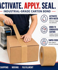 User applying Premium Heavy Duty Water Activated Packing Tape With Badass Hold Fiberglass Kraft Backing for secure carton sealing.
