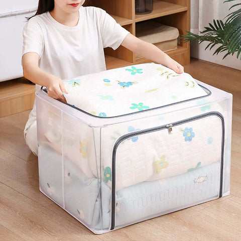 Person using Huge 80L Foldable Storage Bins Organizer With Metal Frame And Durable Handles Clear And Gray 3 Pack For Clothes Bedding Toys