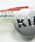 Kia Wheel Hub Cap Assembly 52960-1Y200 OEM new center cap with Kia logo and packaging visible