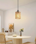 Straight Up Chic Boho Lighting Vibe For Your Sweet Space Featuring This Super Bright 3 Pack Woven Rattan Pendant Fixture with round shade in dining area.