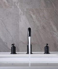 Front view of 8 Inch Two Handle Widespread Matte Black Bathroom Faucet With 360 Swivel Spout for 3 Hole Sinks with water running.