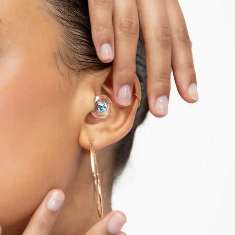 Close-up of ear with Customizable Gemstone Earplugs With 21 dB Noise Reduction For Clear Hearing At Concerts and Festivals