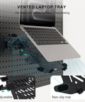 Ultra Top Notch Articulating Pegboard Mount For Laptops And Computer Screens Featuring Ventilated Trays on a pegboard.
