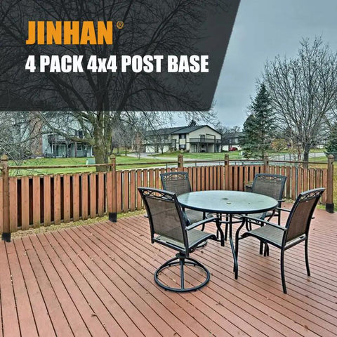 Outdoor deck with 4x4 Wood Fence Post Base Brackets Beefy Built Heavy Duty Powder Coated 13 Gauge Steel Anchor Set installed.