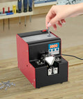 Auto Feed Screw Feeder Machine With Five Speed Settings And Dual Counting Modes For M1.0 To M5.0 Screws in use, dispensing screws.