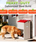 Dog using Heavy Duty Automatic Dog Feeder For Large Dogs With 25lb Gravity Bowl Clear Window View And Easy Push Gate Design For Big Hounds And Hustling Pet Parents Daily by the entrance.
