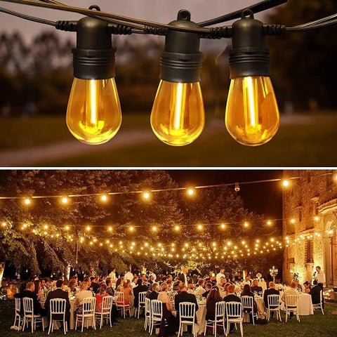 27Ft Outdoor String Lights With 10 Dimmable Edison Vintage Bulbs Shatterproof And Weatherproof Heavy Duty Commercial Grade Cafe Patio Market Light For Backyards Decks Gardens And Outdoor Parties illuminating an outdoor event.