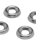 Overhead view of four stainless steel cup countersunk washers No. 10 size.