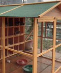 Image of a chicken coop using Half Inch Hardware Cloth 24 Inch By 100 Foot 19 Gauge Galvanized After Welding Wire Mesh Roll for security.