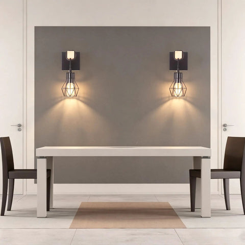 BANGANMA 2 Pack Farmhouse Wall Sconces, Hardwired E26 Wood Cage for Bedroom, set above a modern table with chairs.