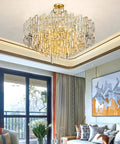 Sleek Crystal Ceiling Pendant Light With Modern Designer Shape And Energy Efficient Led Bulbs For Living Room Or Dining Area, elegantly illuminating a modern living room.