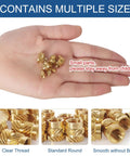 Hand holding brass 305 Piece Knurled Threaded Insert Nuts Set For Plastic 3D Printing And Injection Molding Brass Heat Set Inserts M2 To M6 14 Sizes And 6 Bore Options Durable Corrosion Resistant Kit For DIY Folks