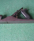 Tough As Nails Cast Iron Workhorse Bench Plane For Smoothing Wood Projects With Tempered Steel Cutter Contractor Grade Precision ground 14 inch tool with brass knob.