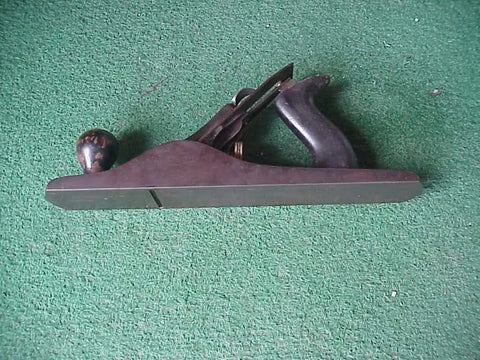Tough As Nails Cast Iron Workhorse Bench Plane For Smoothing Wood Projects With Tempered Steel Cutter Contractor Grade Precision ground 14 inch tool with brass knob.