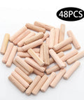 Wooden Dowel Pins 48 Pieces 6mm By 25mm And One Quarter Inch By One Inch Fluted Beveled Ends Hardwood Pegs on white background