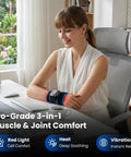 Woman using Infrared Heated Wrist Wrap With Vibration Massage for carpal tunnel and arthritis at a desk