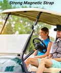 Golf Rangefinder With Slope 1200 Yard Distance, Magnetic Strap, attached to golf cart; two people seated outdoors.