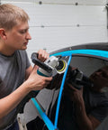 Man using 11Pcs Pro Grade Car Buffing Pads For Drill Polishing Kit with adapter on car window for scratch-free finish