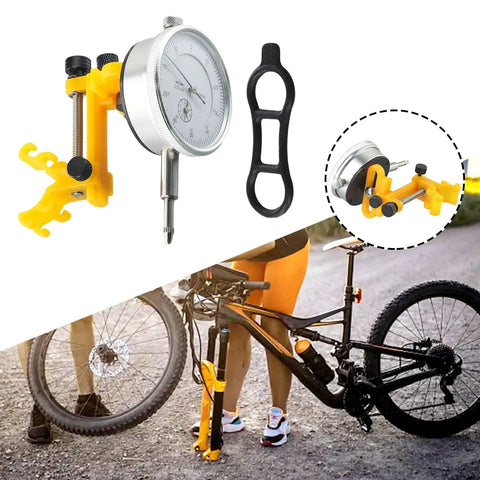 Pro Bike Wheel Truing Stand And Rim Adjustment Tool used for precise spoke alignment during on-bike repairs with cyclist.