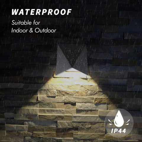 10W 3000K Waterproof IP65 Indoor Outdoor Wall Sconce LED Light Fixture illuminating stone wall in rain