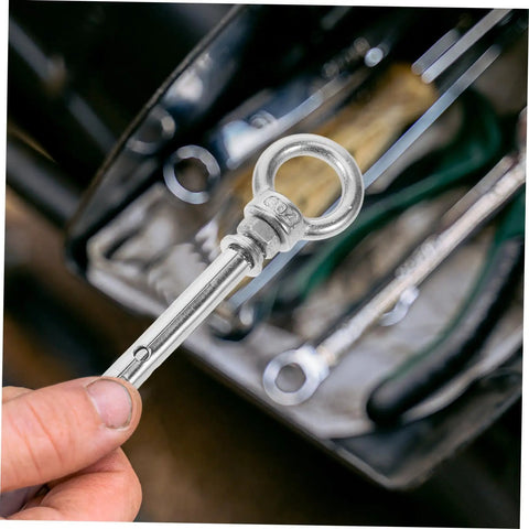 Heavy Duty Stainless Steel Eye Bolts Hanger Kit 5 Piece For Secure Lifting And Suspension Ideal For Yoga Swings Hammocks And Heavy Equipment Installations Durable Easy To Install Safety Hardware, stainless eye bolt held in hand