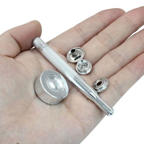 Hand holding 150 Piece Canvas Snap Kit Stainless Steel Marine Grade 3 Eighth Inch Socket Snaps Easy Install With Two Setting Tools