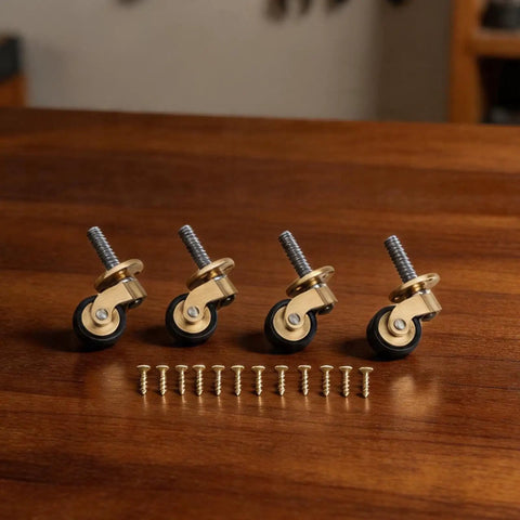 Solid Brass Caster Wheels 4pcs Silent Bearing Furniture set on a wooden surface with screws for installation.