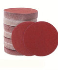Premium 5 Inch Hook And Loop Sanding Discs With Durable Aluminum Oxide abrasive For Heavy Duty Wood Metal Work In 60 To 1000 Grits stacked and loose discs.