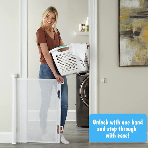 Woman using Retractable Baby Gate With Mesh For Quick Room Conversion And Kid Friendly Living Extends 0 To 55 Inches Wide And 33 Inches High