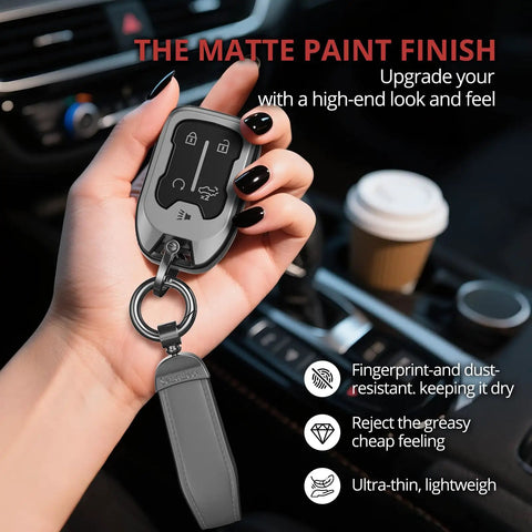 Slick Matte TPU Key Fob Cover For Chevy Gmc With Leather Strap Keychain held in hand, showcasing matte finish and slim design.