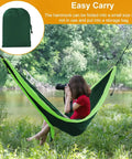 All In One Camping Hammock With Heavy Duty Tree Straps 660 Lb Capacity Portable Outdoor Hammock Tent in use by a river