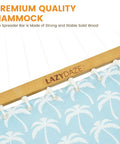Close-up of the spreader bar and coastal floral fabric of the Two Person 12Ft Quilted Fabric Hammock With Soft Pillow For Outdoors Patio Poolside Beach Cozy Hangout With Spreader Bar And 450 Lbs Capacity Coastal Floral Style.