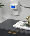 Plug In AC Voltage Tester With LCD Display 80 to 300V Digital Voltmeter Must Have for Home Outlets and Appliances Quick Voltage Monitor to Check 110V or 220V Levels and Safeguard Your Electronics mounted in wall outlet showing 113V