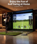 Man using 11' X 8' Indoor Golf Simulator Enclosure Kit with 4K Ready Impact Screen for home practice session