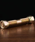 Close-up of a metal bolt from the 6 Piece Swing Chair Hanging Hardware Kit with Shock Absorption for indoor and outdoor hammock setup.