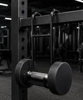 Dumbbell Hook For Pain Free Grips Non Slip Anti Fatigue Weightlifting Accessory with Solid Iron Build hanging in gym.