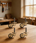 Solid Brass Caster Wheels 4pcs Silent Bearing Furniture on wooden surface, showcasing smooth and silent mobility.