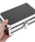 Kick Ass Aluminum Tool Case With Secure Latch And Comfy Carry Handle, held in hand, compact design for power tools storage.