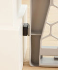 Close-up of pressure-mounted mechanism of Expandable Baby Gate 28 To 42 Inch Wide For Doorways And Bottom Of Stairs Pressure Mounted Safety Gate