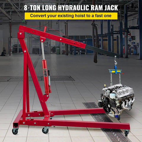 Red VEVOR 8-ton hydraulic long-ram jack with clevis base and single-piston pump lifting a car engine.