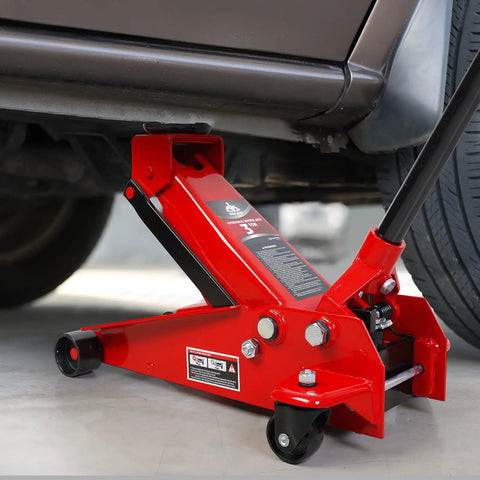 Red 3 Ton Floor Jack With Fast Lift Hydraulic Service Jack made from Heavy Duty Steel lifting a car in a garage.
