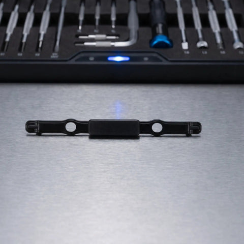 Universal Fit Luggage Handle Release Button Replacement For Hard Shell And Soft Shell Travel Cases Bulletproof Black Plastic Pull Rod on metallic surface.